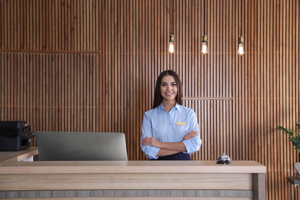 Receptionist at a reception desk